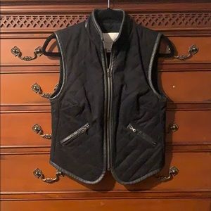Black vest by Adam Lippes